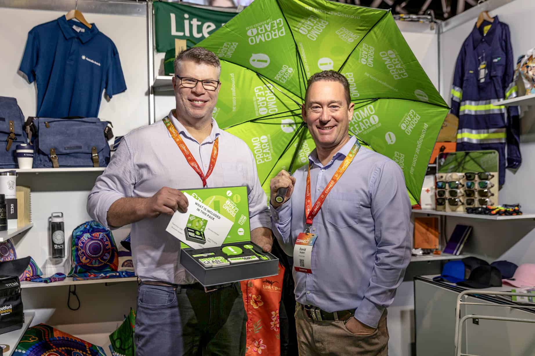 Two of our product experts showcasing our promotional products.